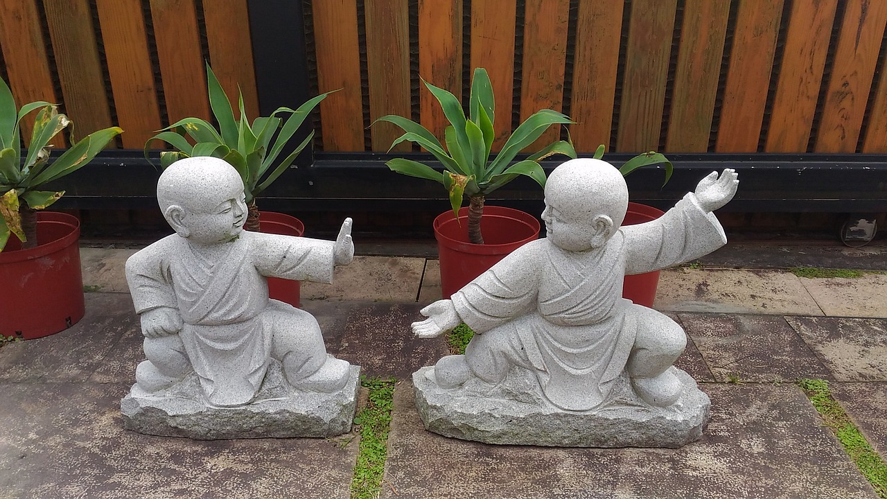 novice monk stone carving buddhism free photo