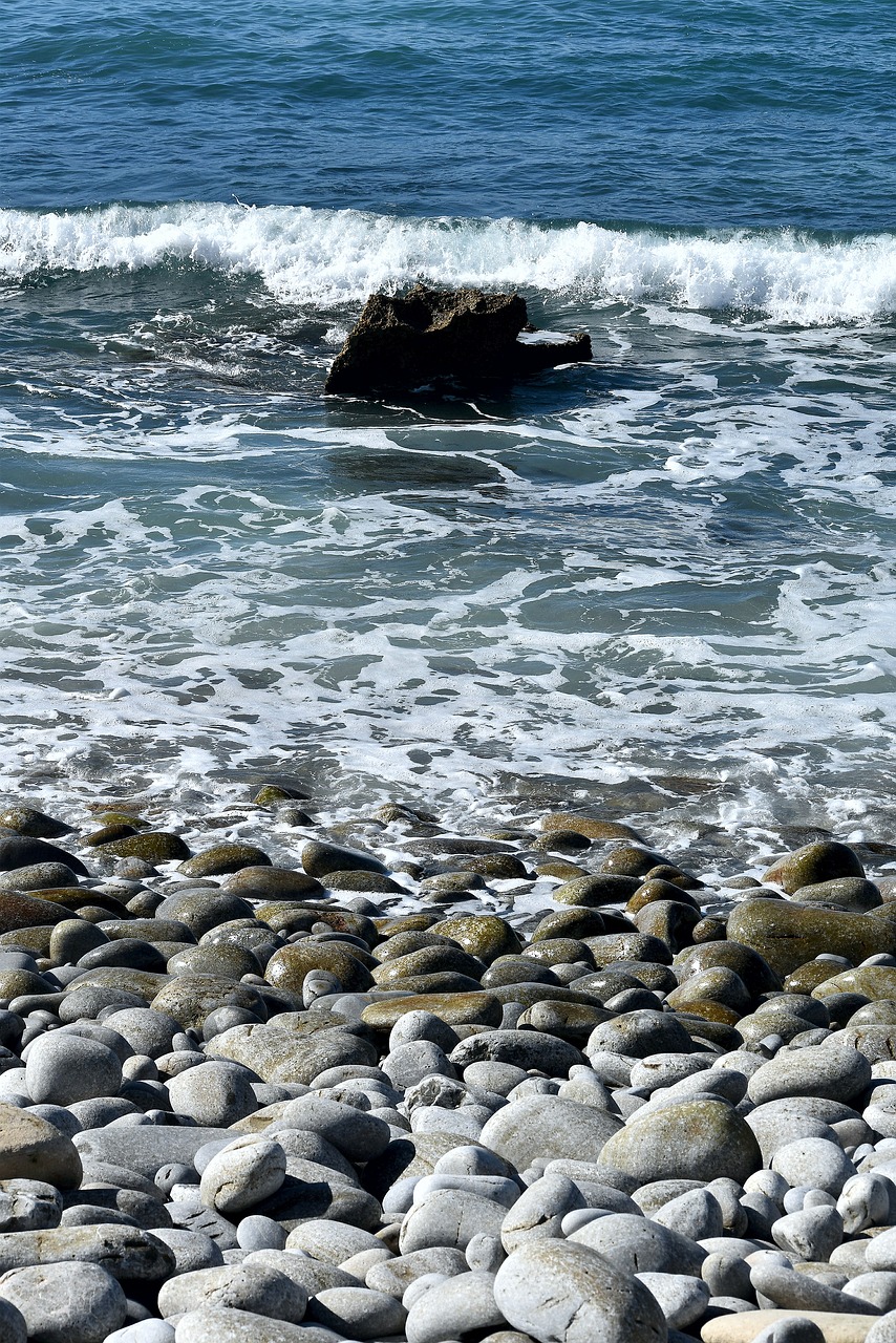 ocean  pebbles  wave free photo