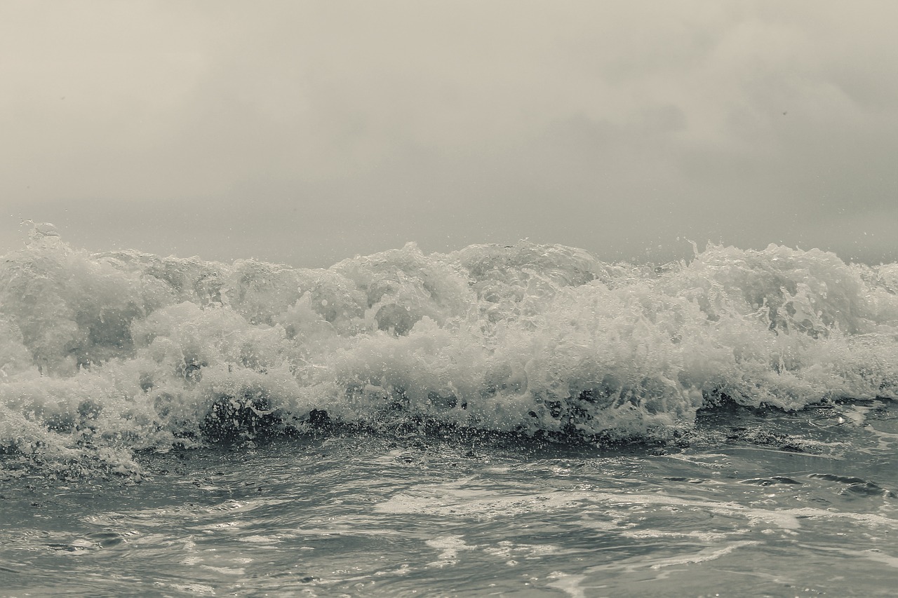 ocean wave cloudy sky ocean free photo