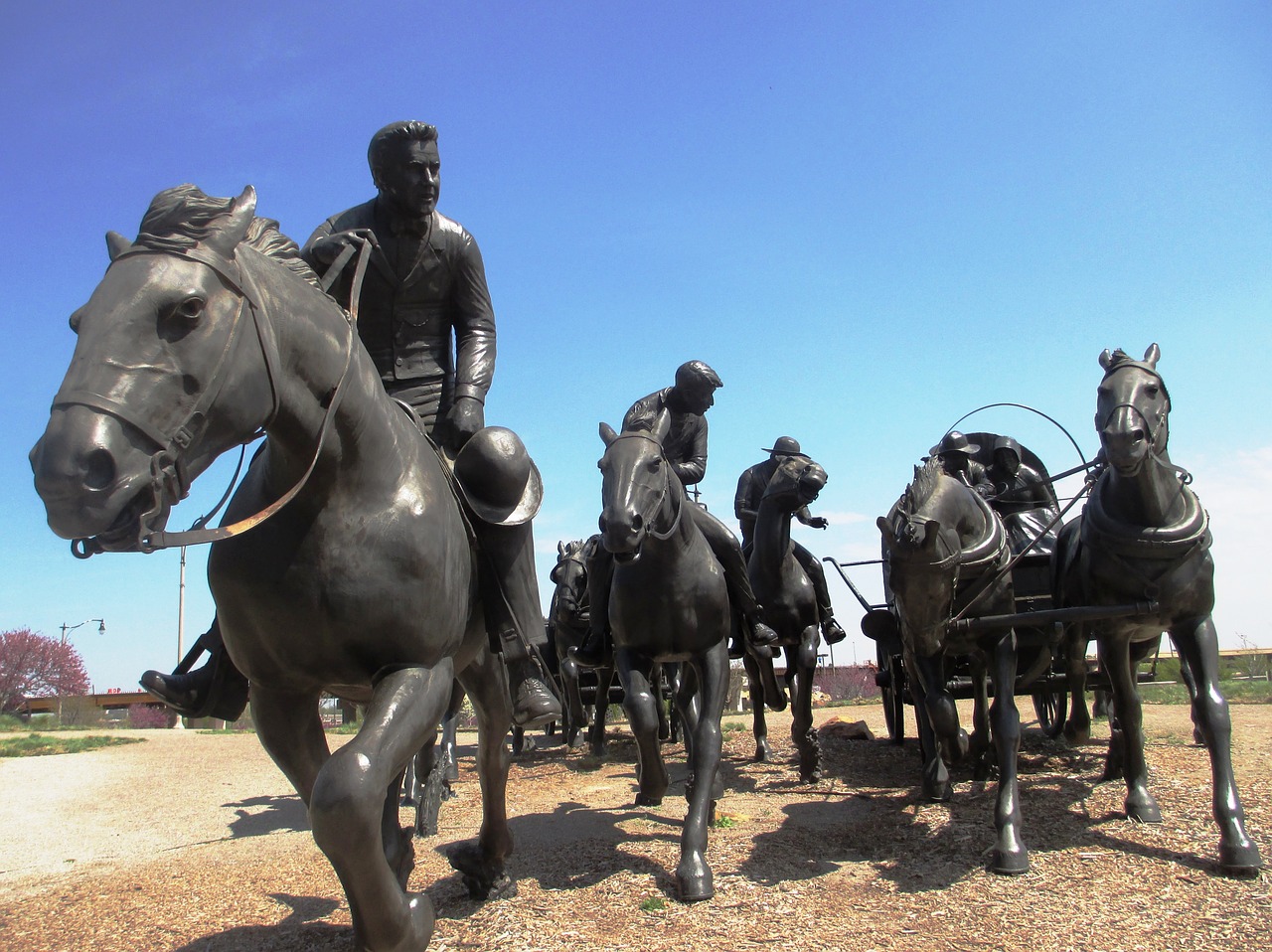 Oklahoma sooners display,river walk park in ok,horses,riders,land rush ...