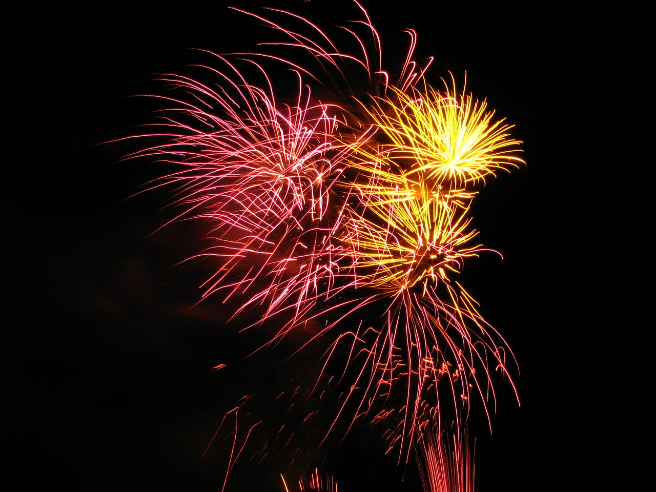 old and new fireworks background free photo