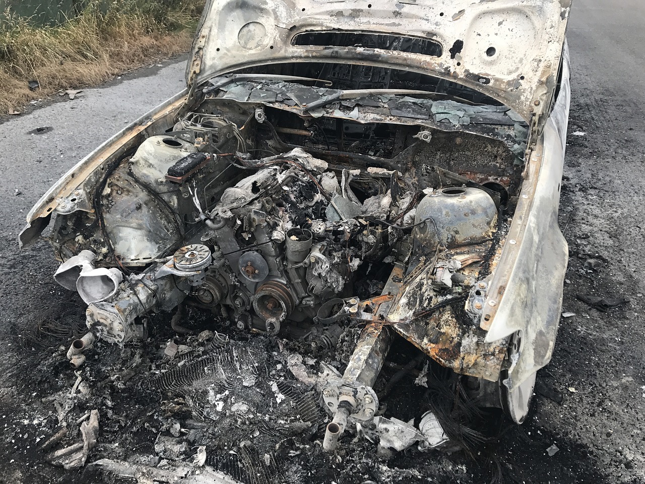 old car frack vehicle burnt out fire damage free photo