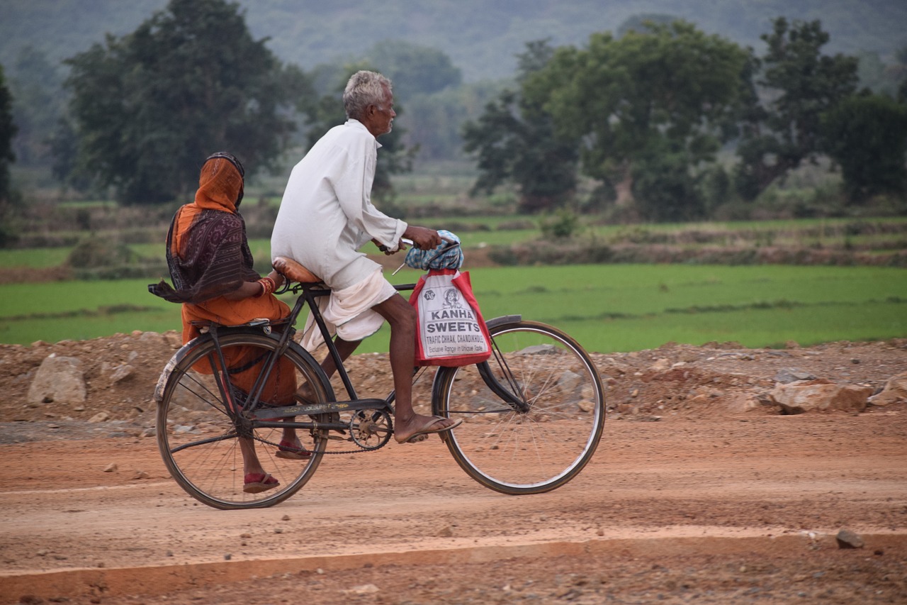 old couple bicycle travel free photo