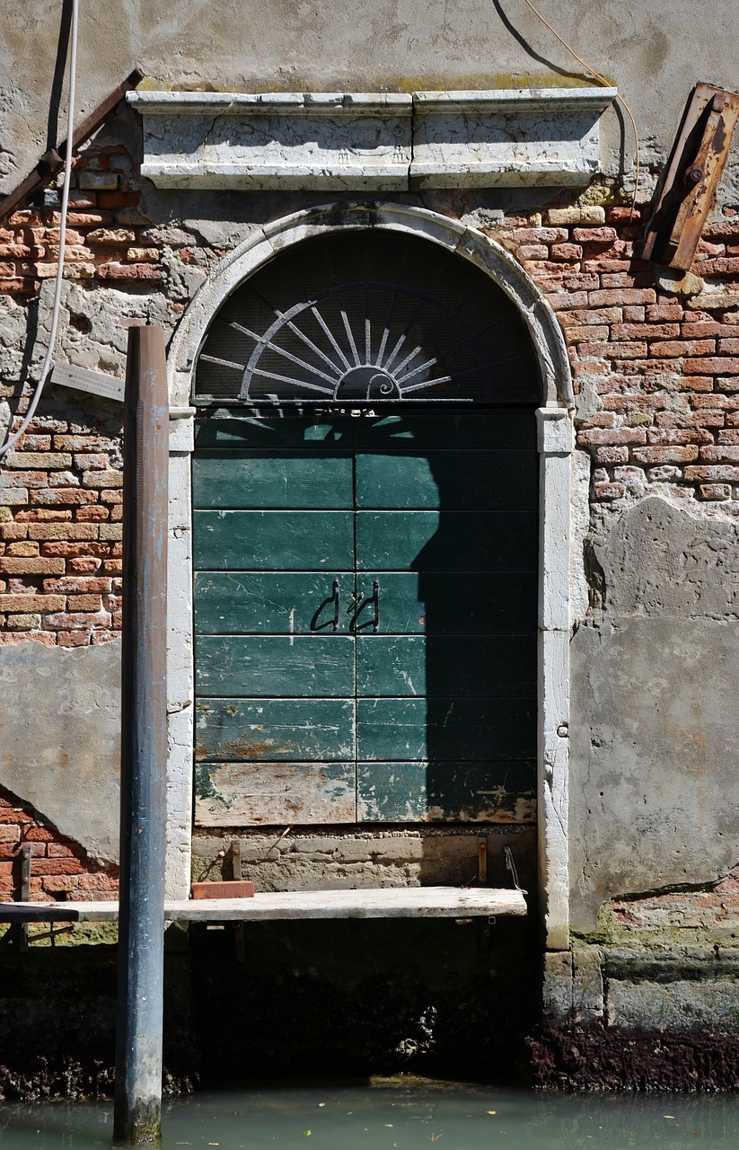 old door venice canal free photo