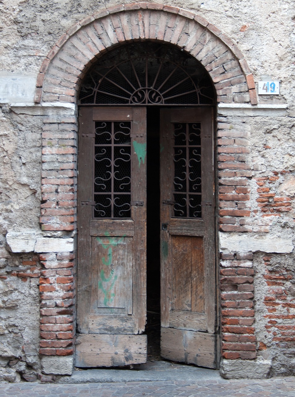 old doorway patched doors dilapidated free photo
