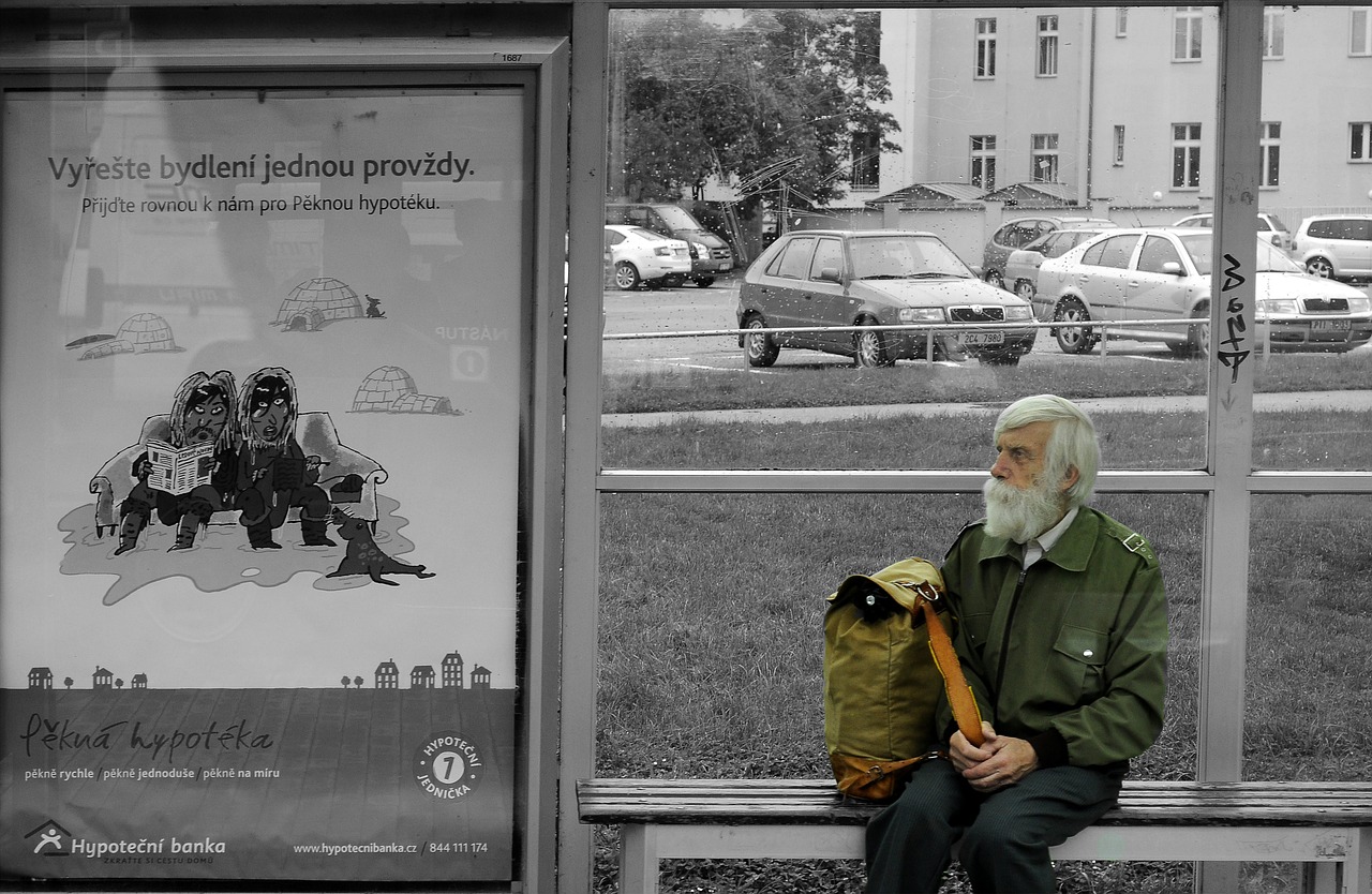 old man bus stop black and white free photo