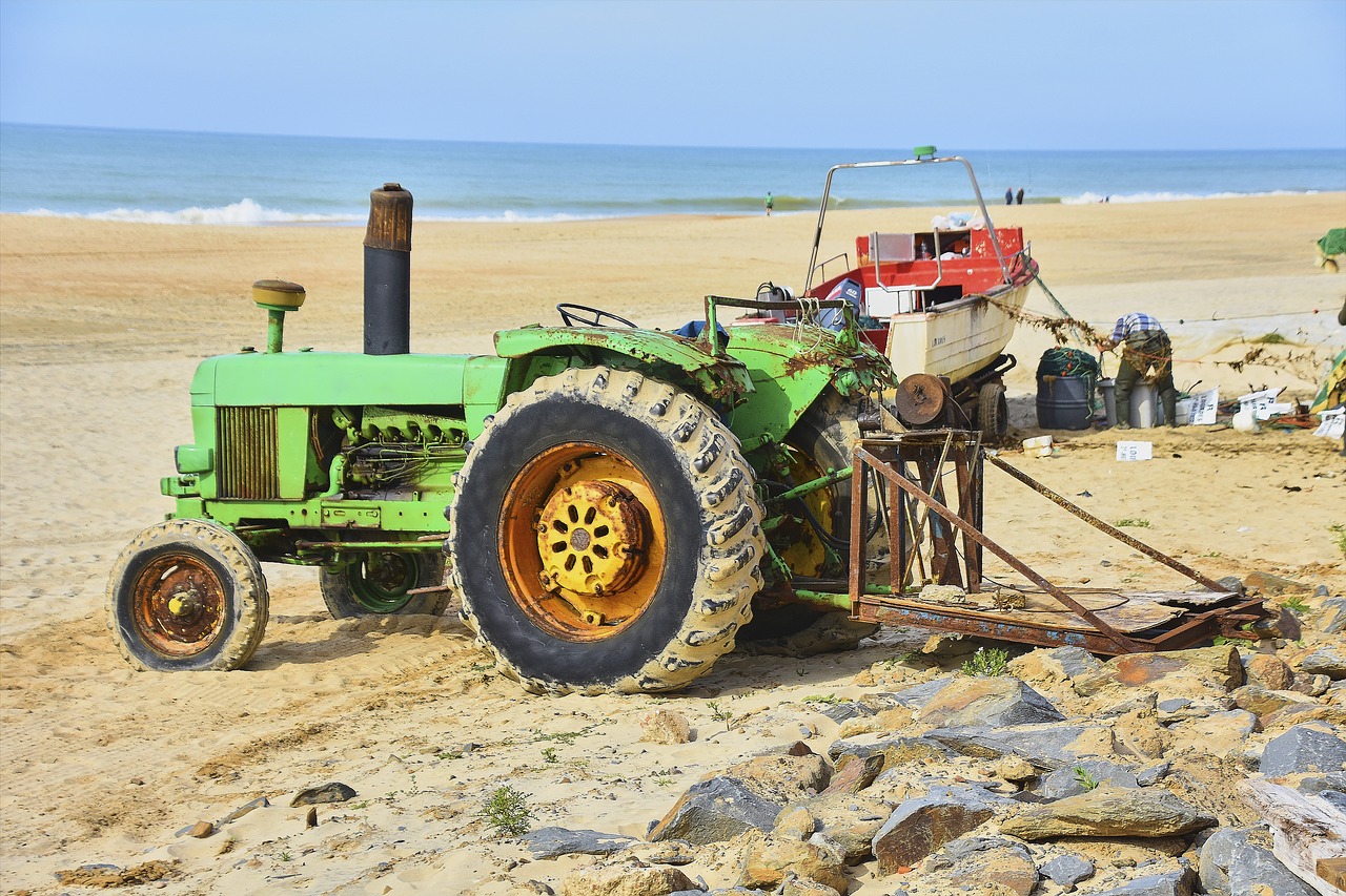old tractor  sea  towing free photo