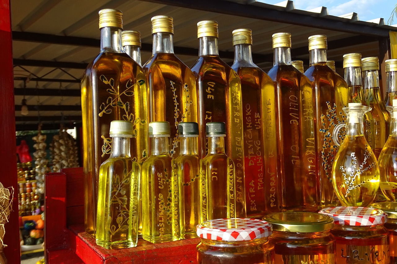 olive oil bottles market free photo