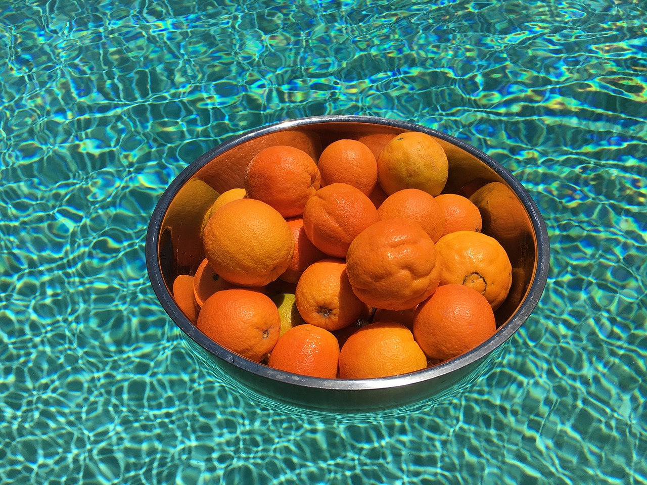 orange metal bowl swimming pool free photo
