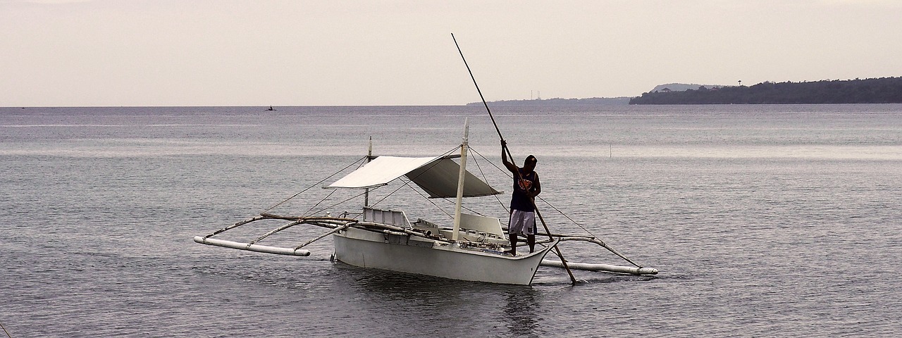 outrigger calm island free photo