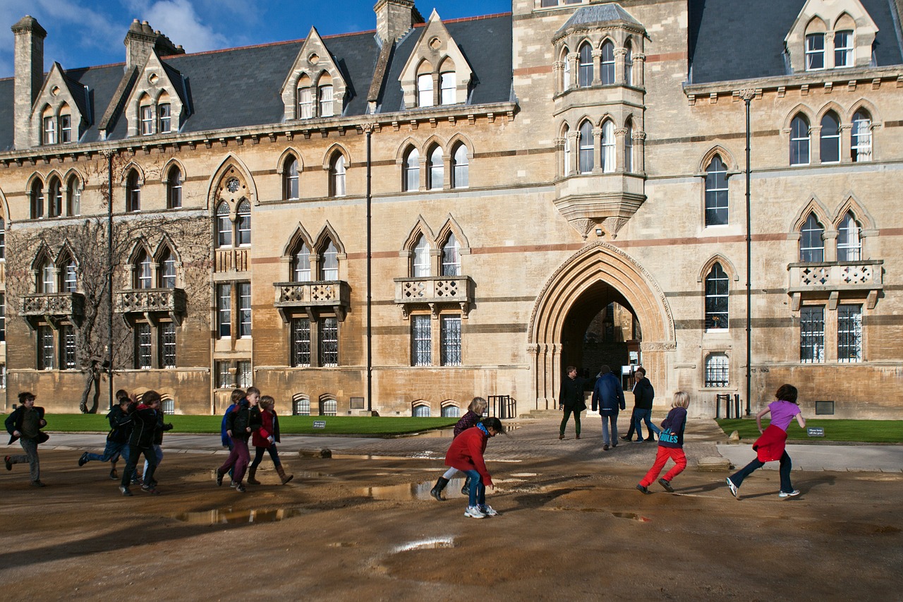 oxford running jumping puddles free photo