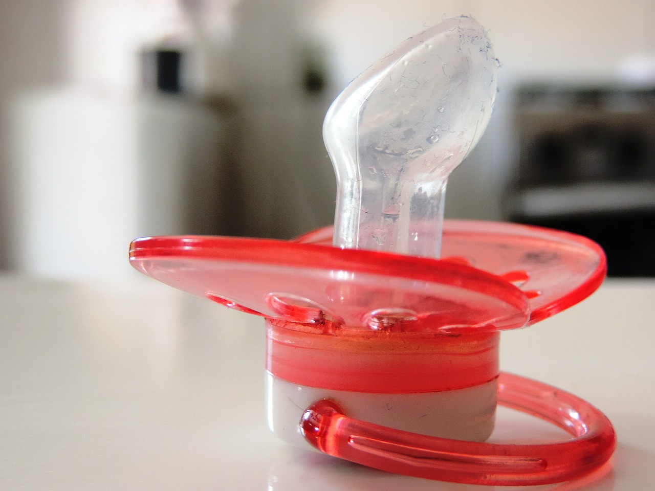pacifier red table free photo