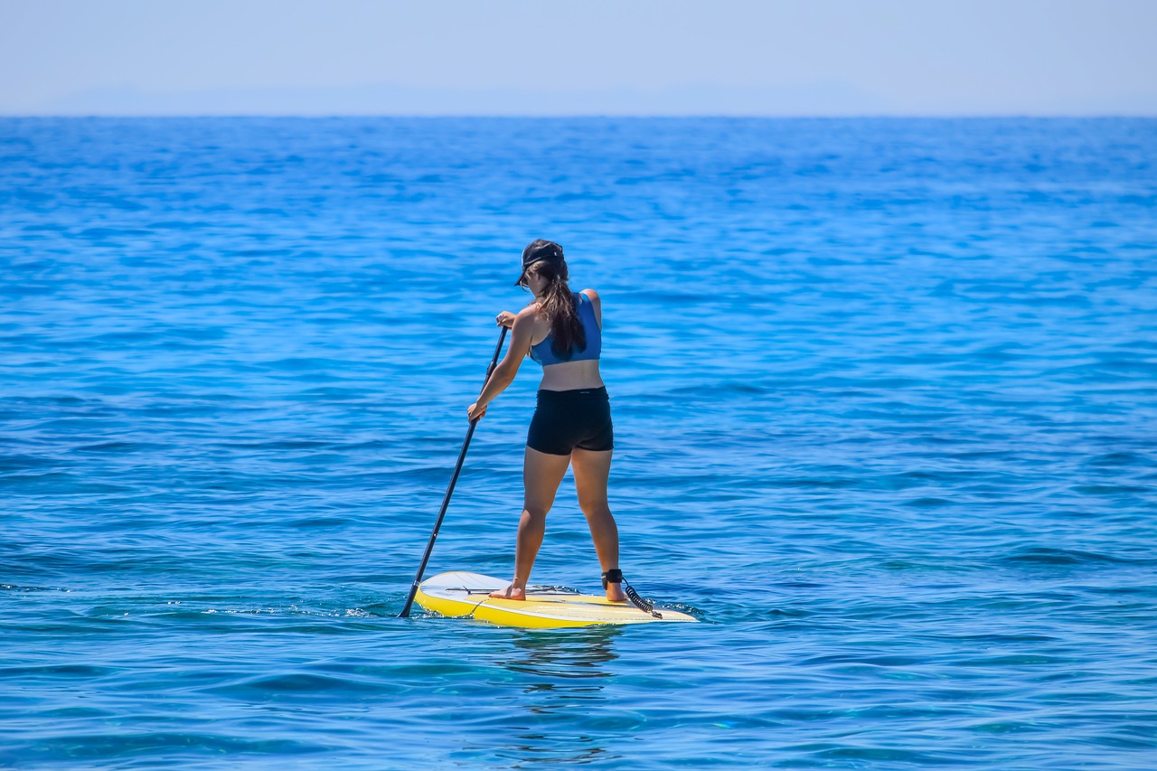 paddleboarding water sea free photo