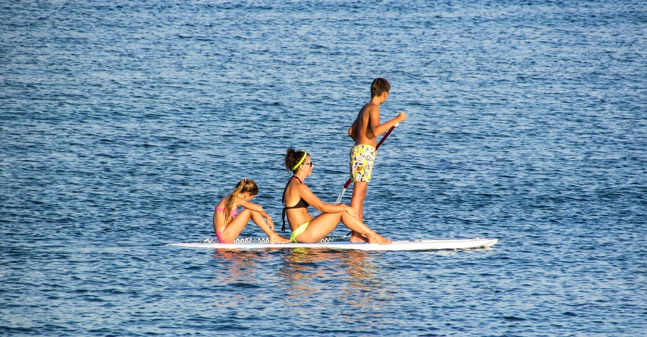 paddling paddle board family free photo
