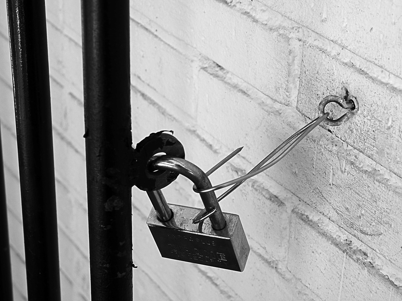 padlock black and white grating free photo