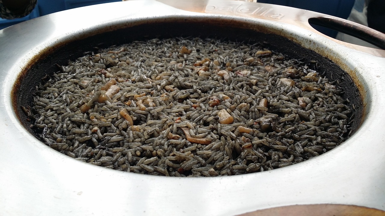 paella  rice  black rice free photo