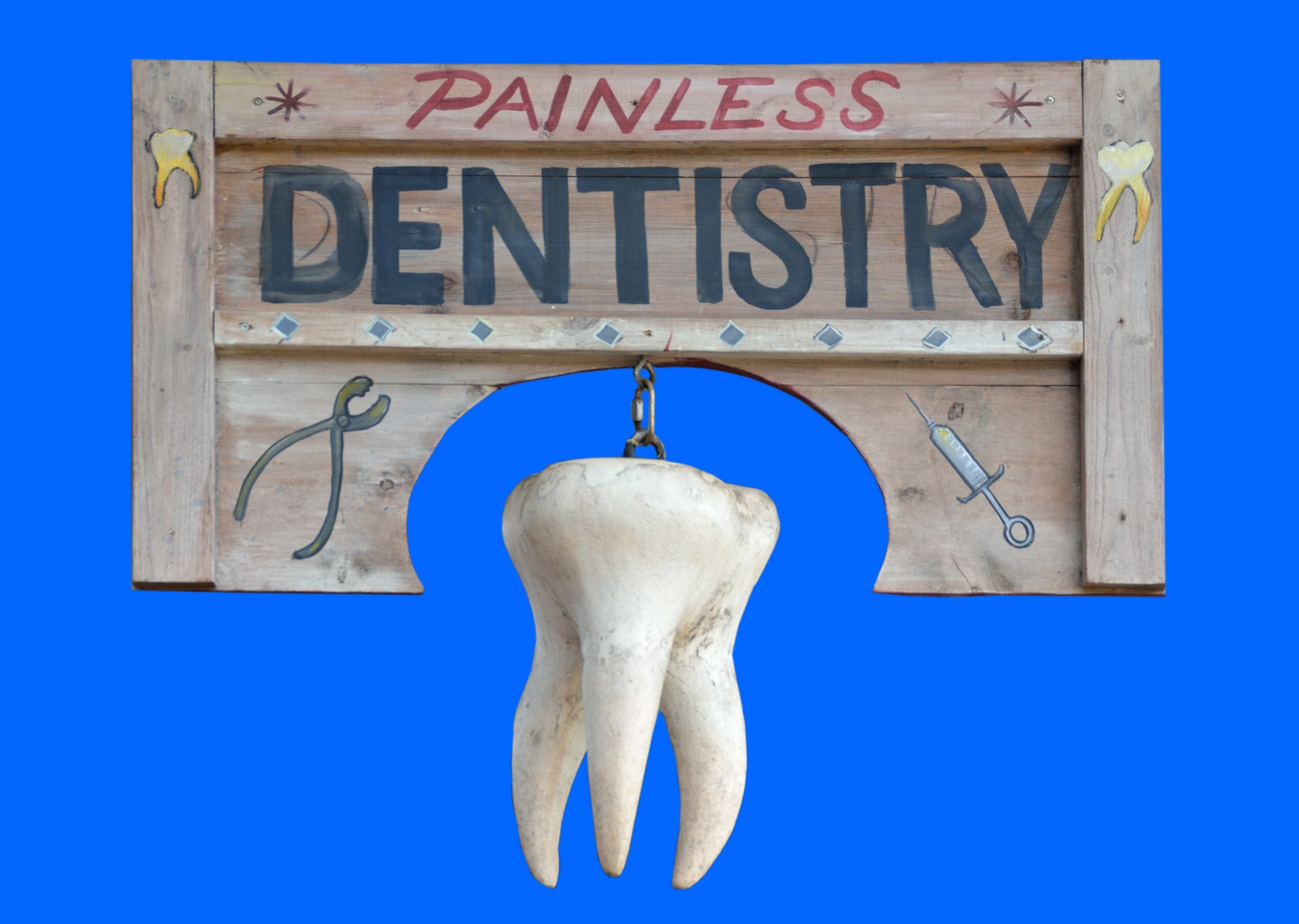 painless dentistry sign free photo