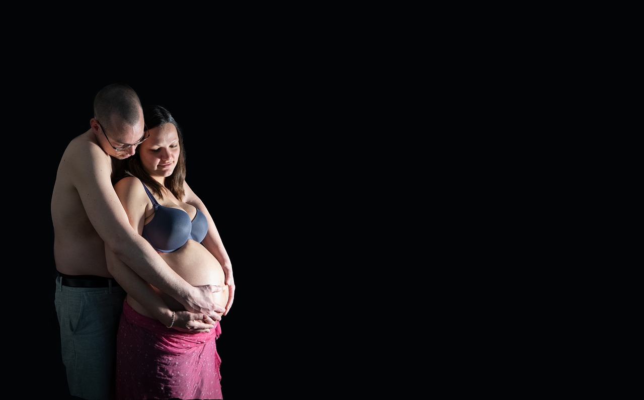 pair  pregnant  baby belly free photo