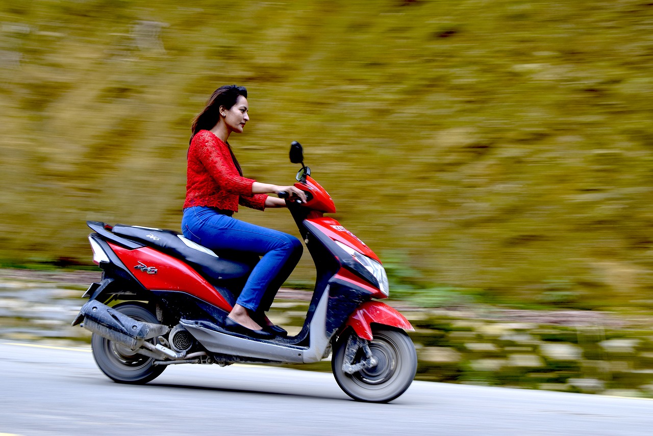 panning scooter speed free photo