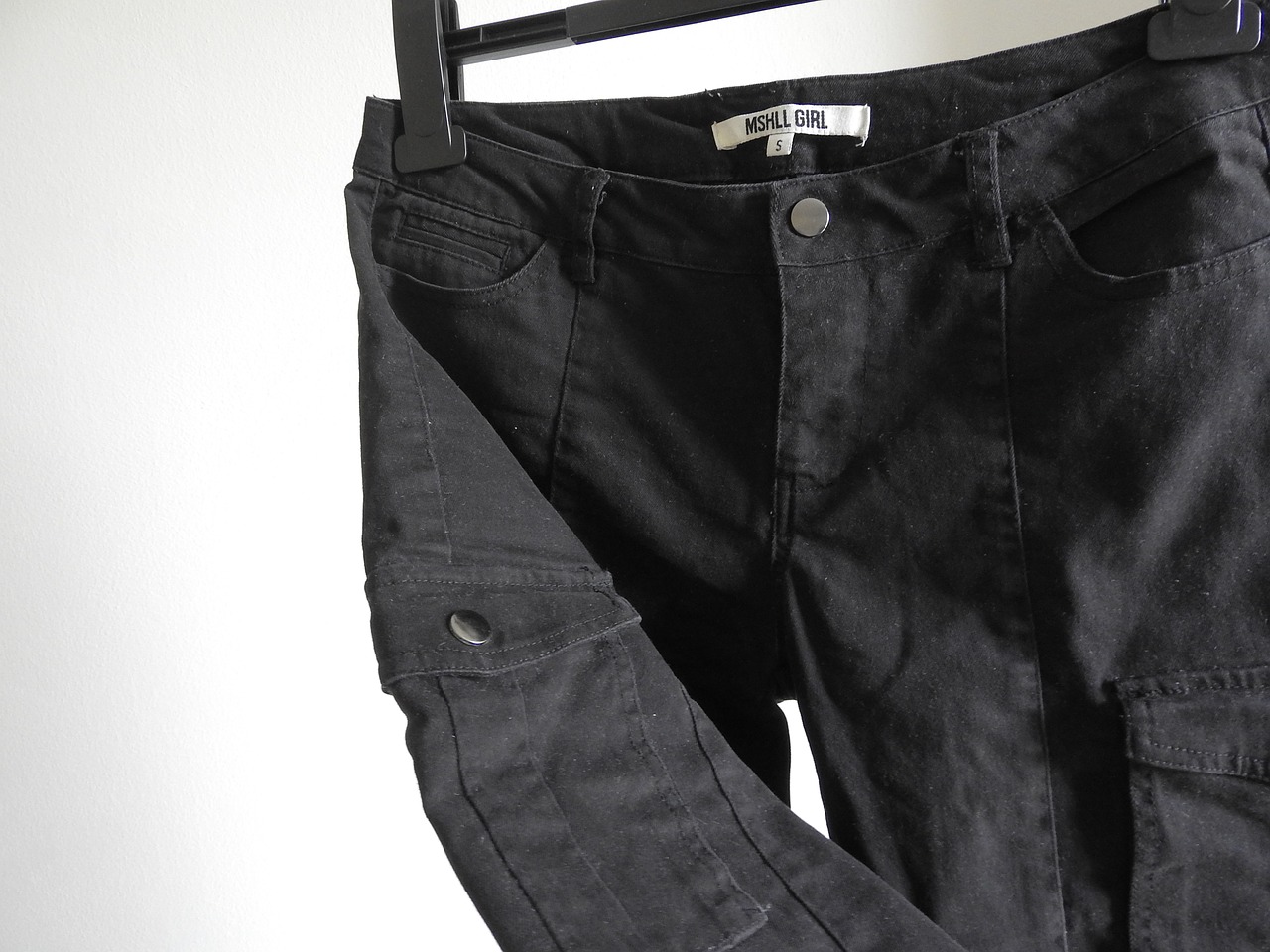pants  clothes on a hanger  women's fashion free photo