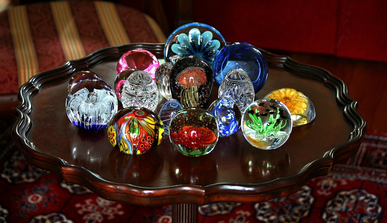 paperweights,colorful,glass,vignette,piecrust table,reflection,light,free pictures, free photos, free images, royalty free, free illustrations, public domain