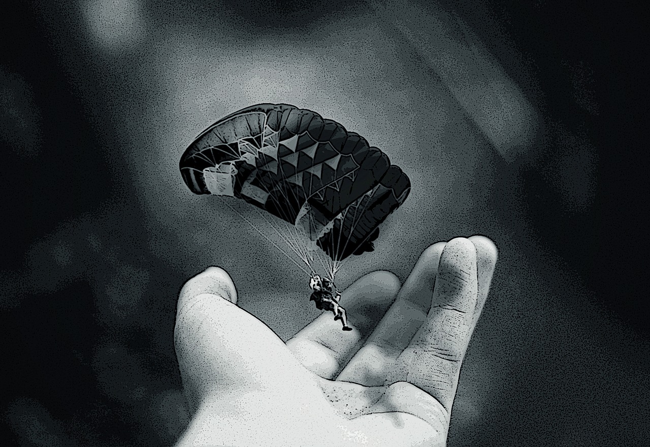 parachute imagination hand free photo