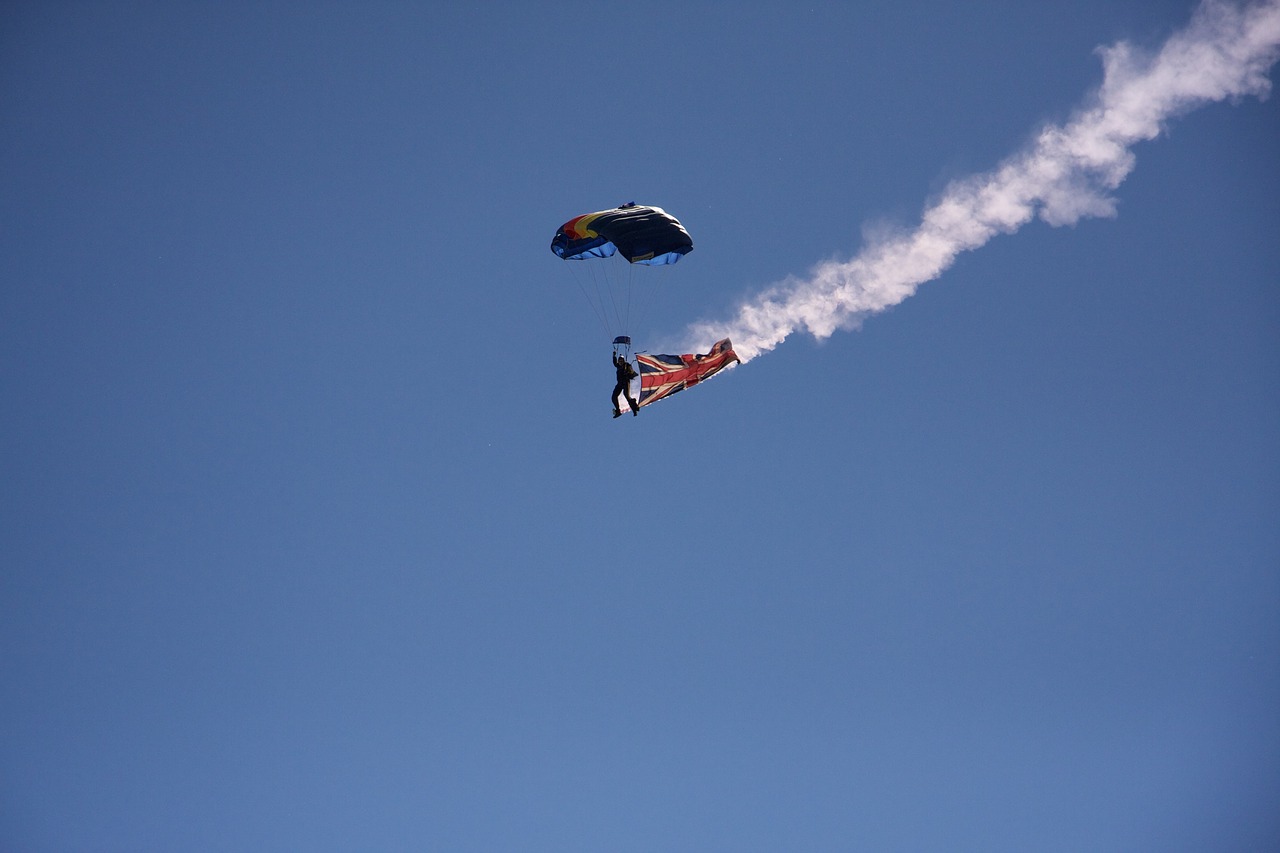 parachute skydiving blue sky free photo