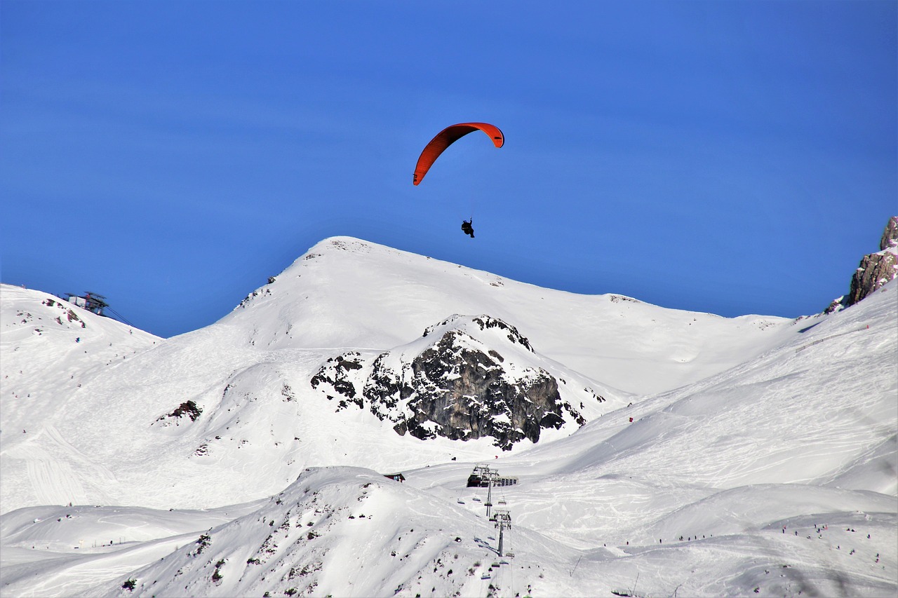 parachute  paragliding  snow free photo