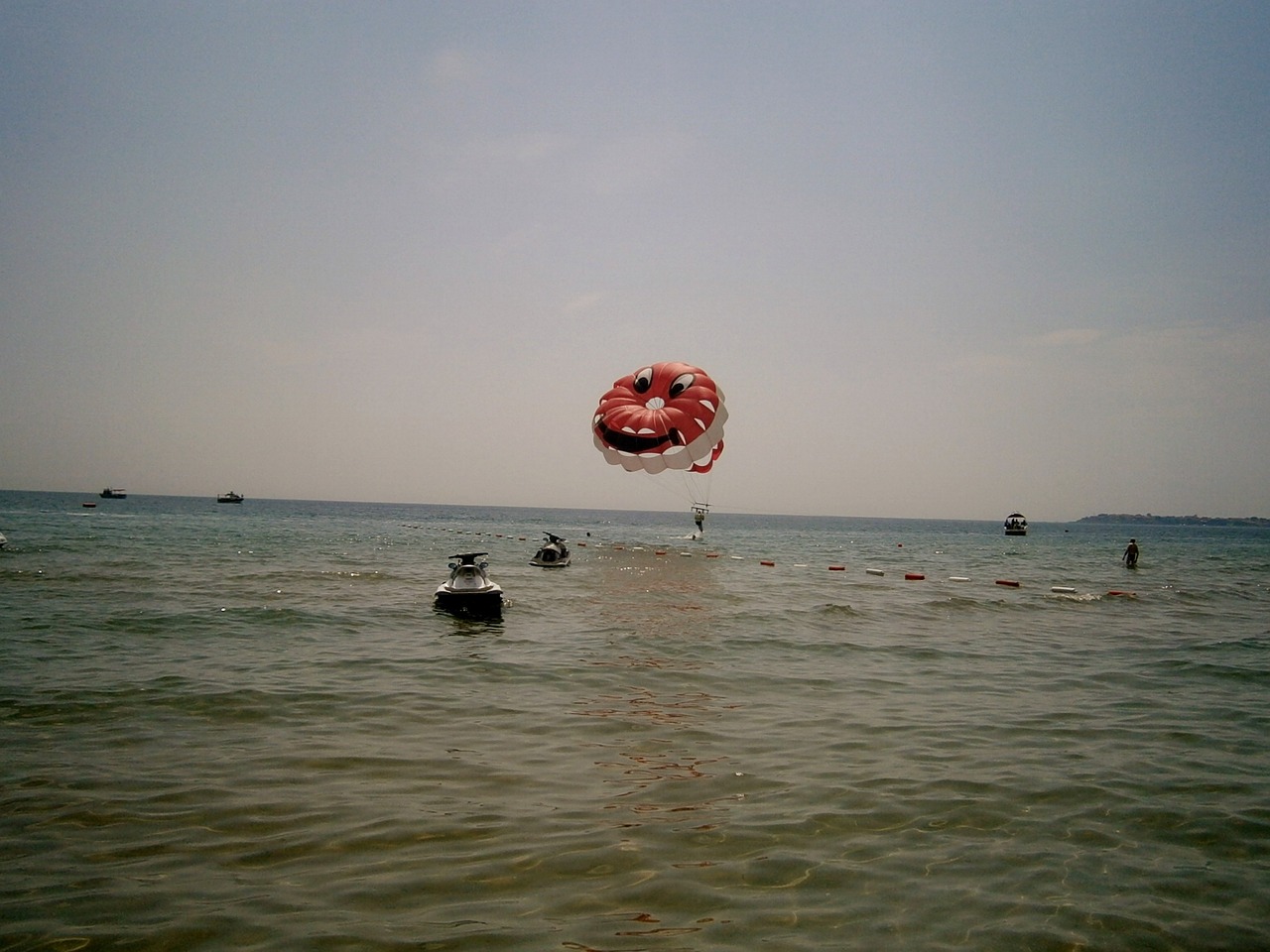 parachute at sea parachute sea free photo