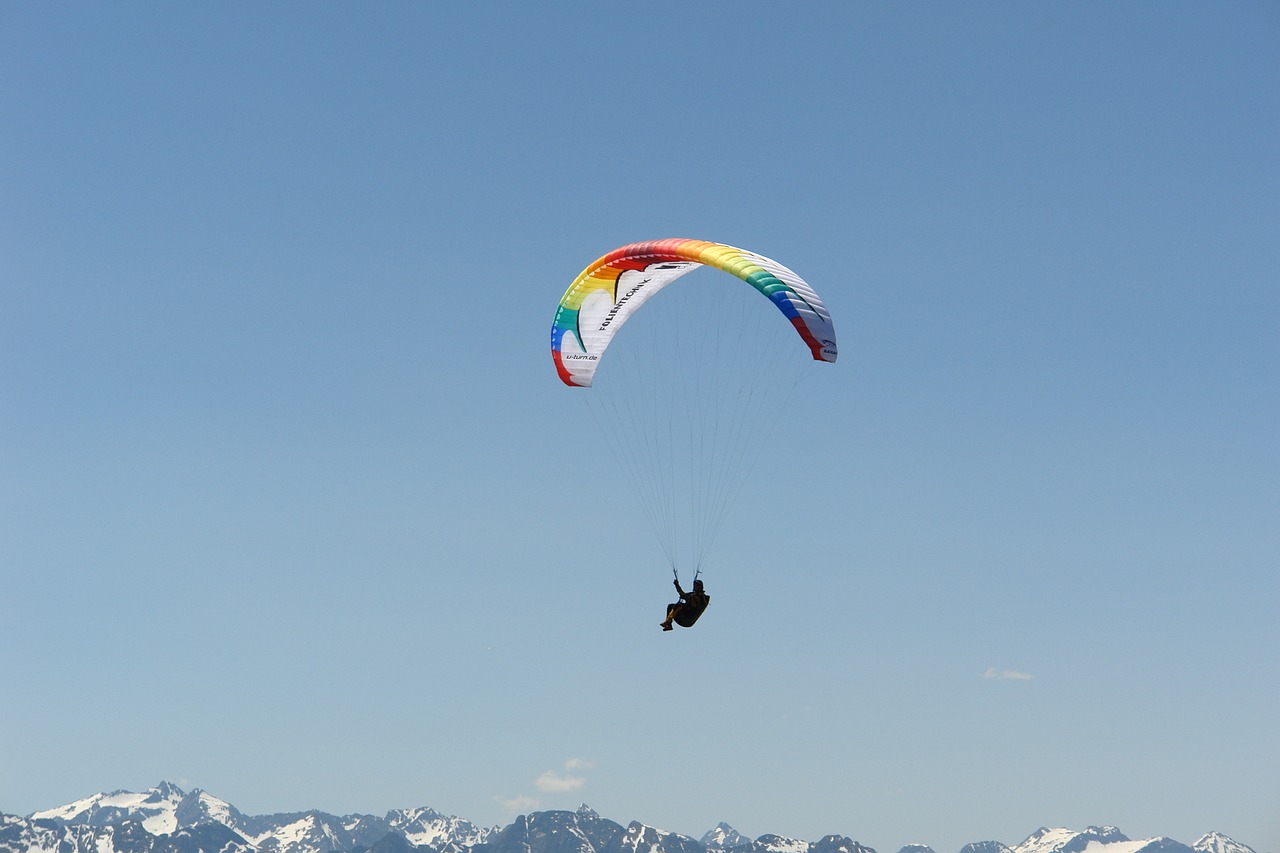 paraglider mountains sky free photo