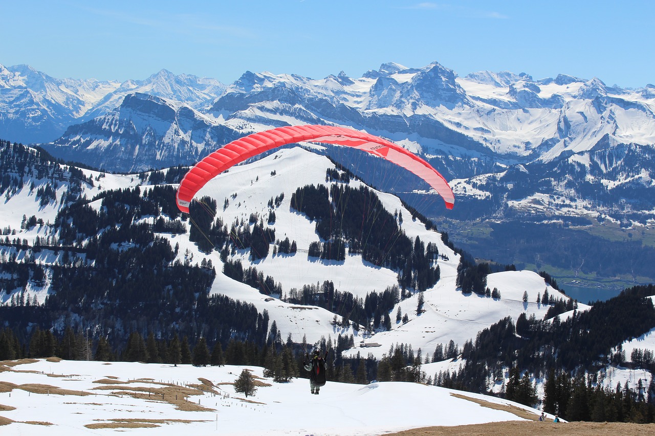 paraglider winter scape switzerland free photo