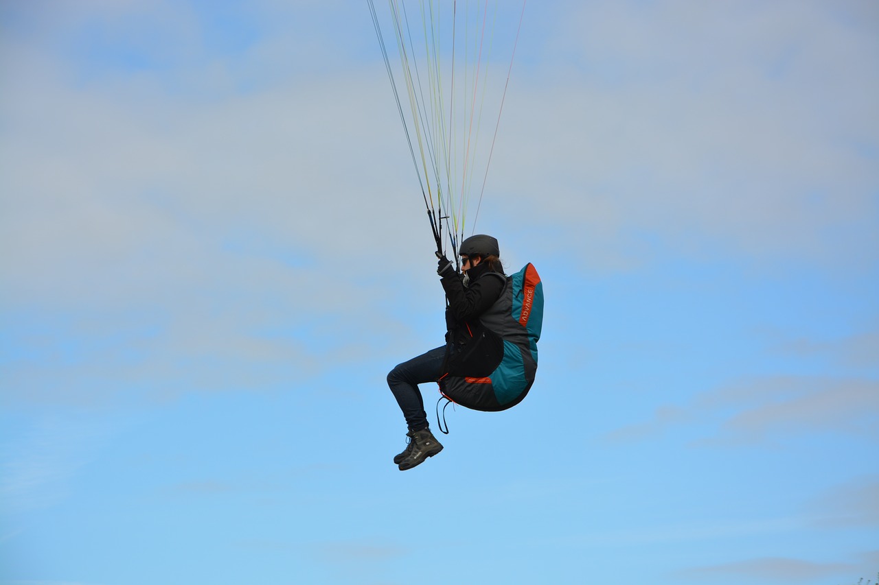 paraglider  paragliding  paraglider pilots sit harness free photo