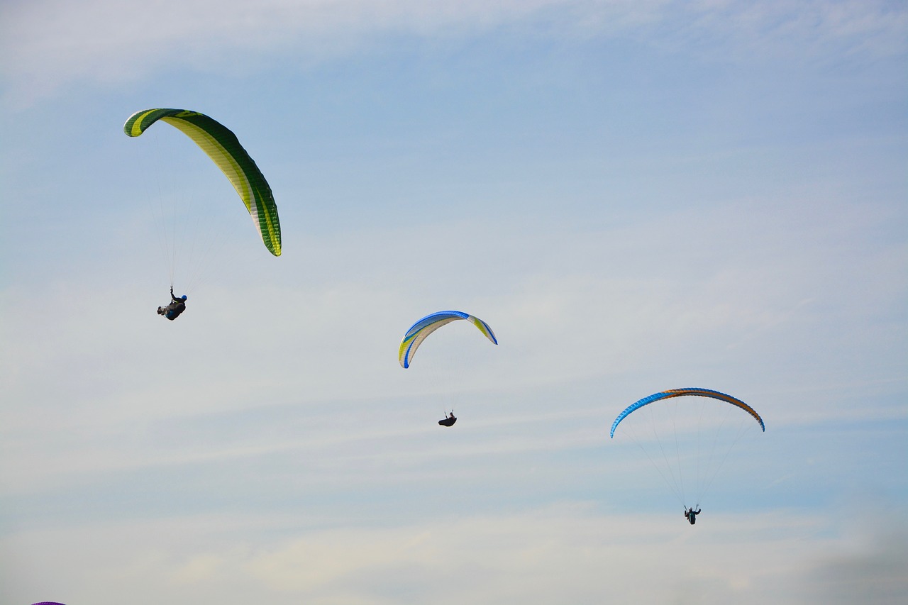paragliders practice in free flight para motor free photo
