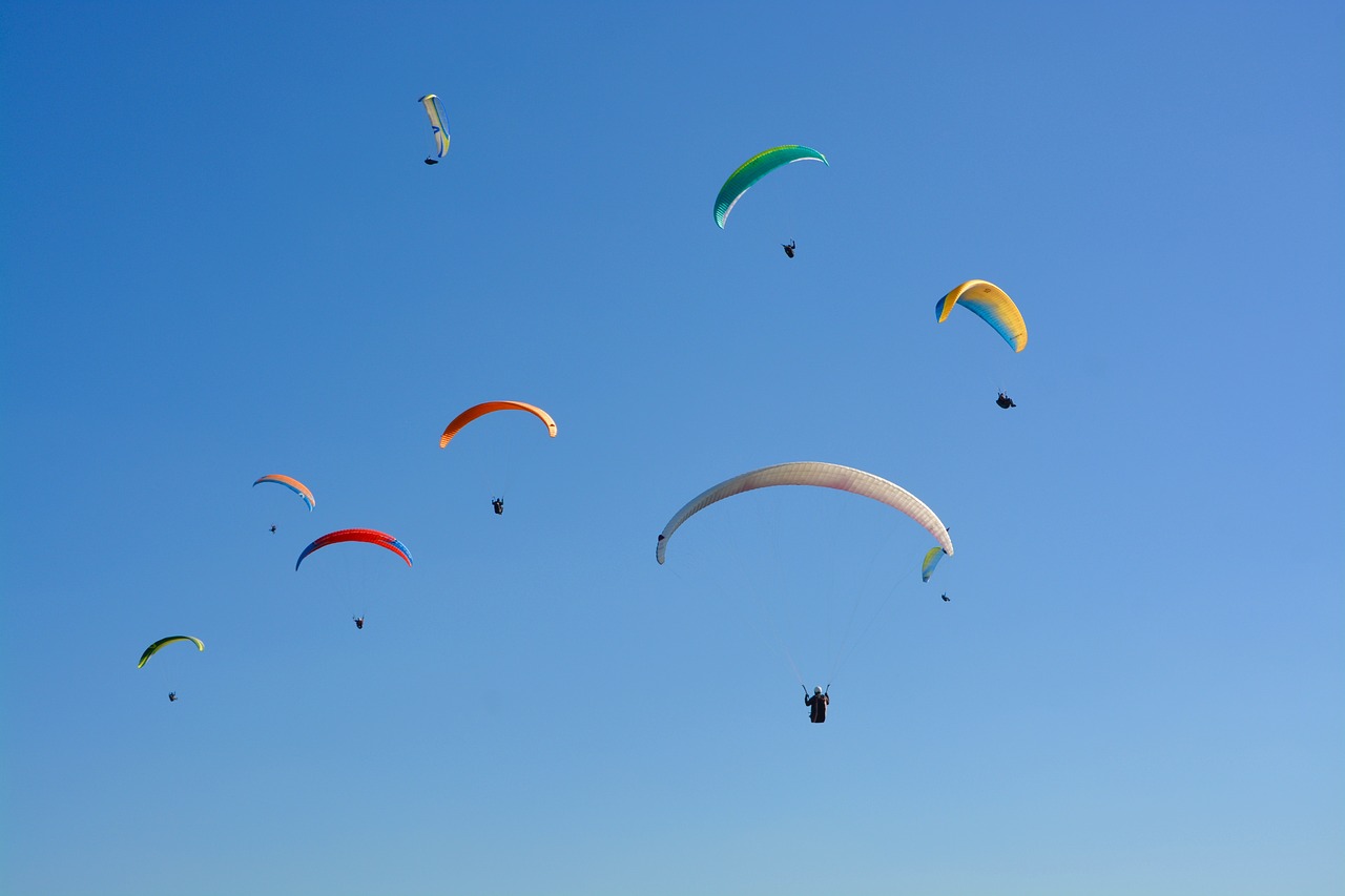 paragliders paragliders  blue sky  free flight free photo