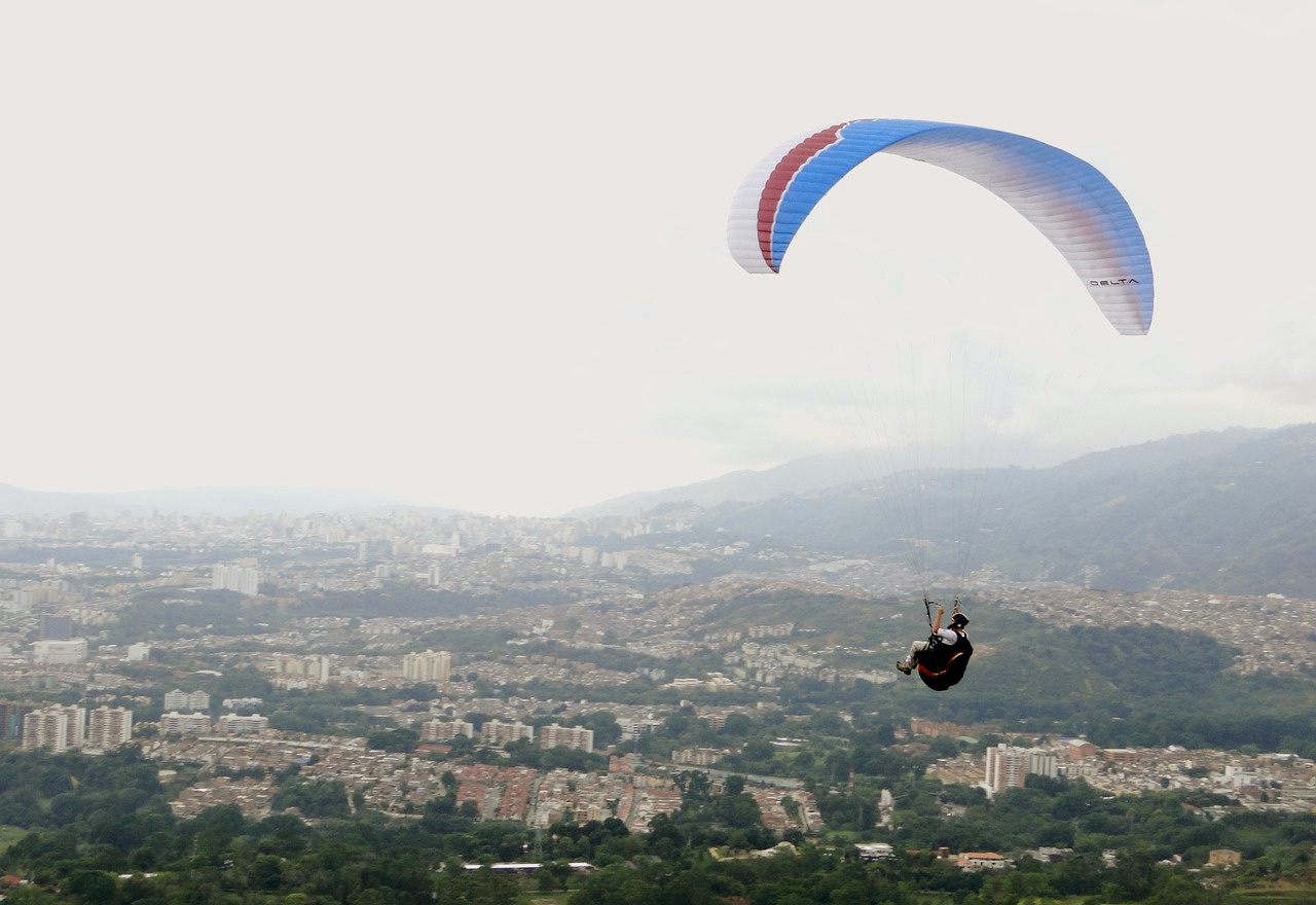 paragliding landscape city free photo