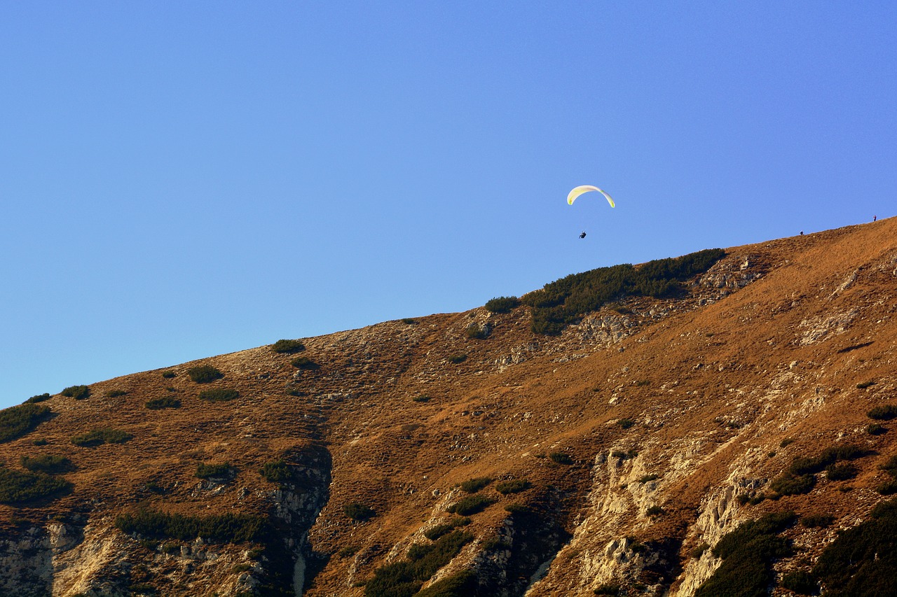 paragliding mountain fly free photo
