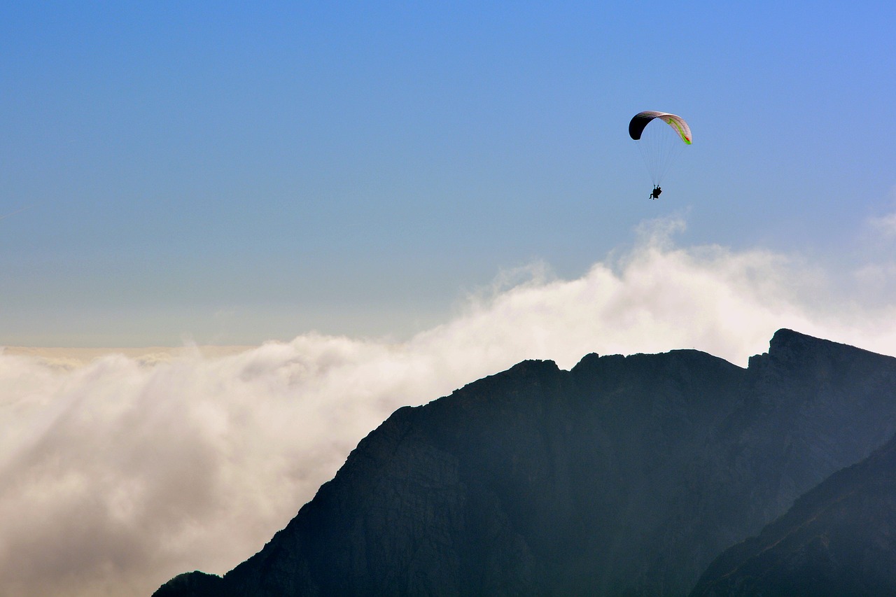 paragliding mountain fly free photo