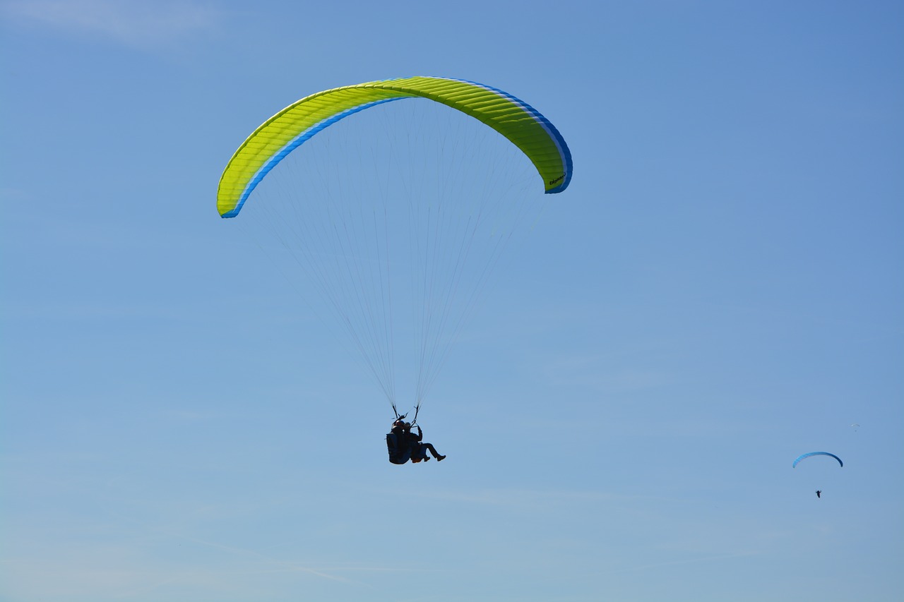 paragliding blue sky annecy free photo