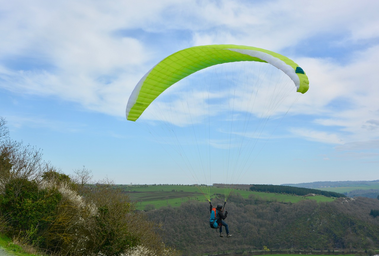paragliding  take-off of a cliff  wing paraglider inflated free photo