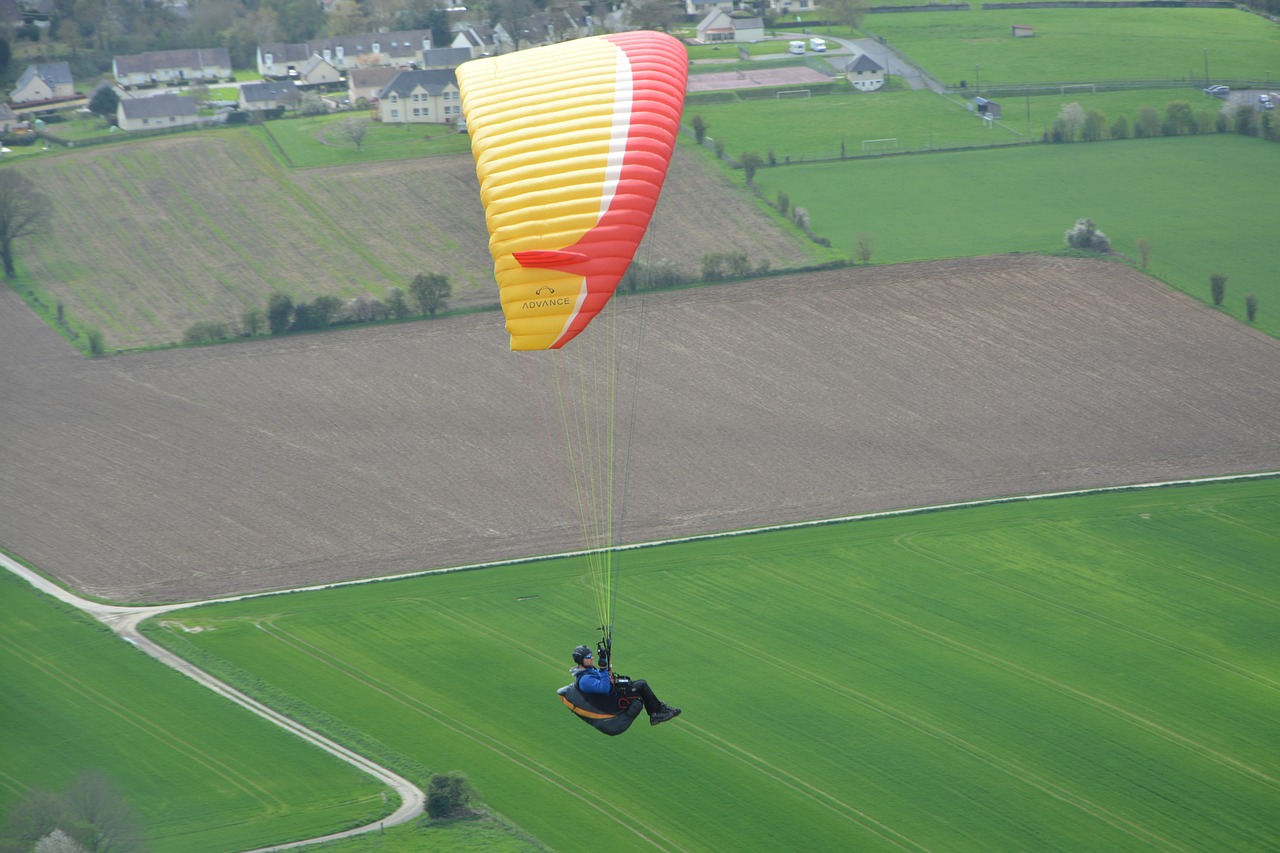 paragliding  wing paragliding  sailing orange free photo