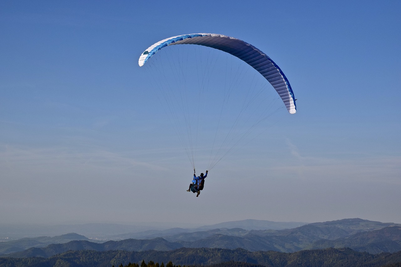 paragliding  glider  sky free photo