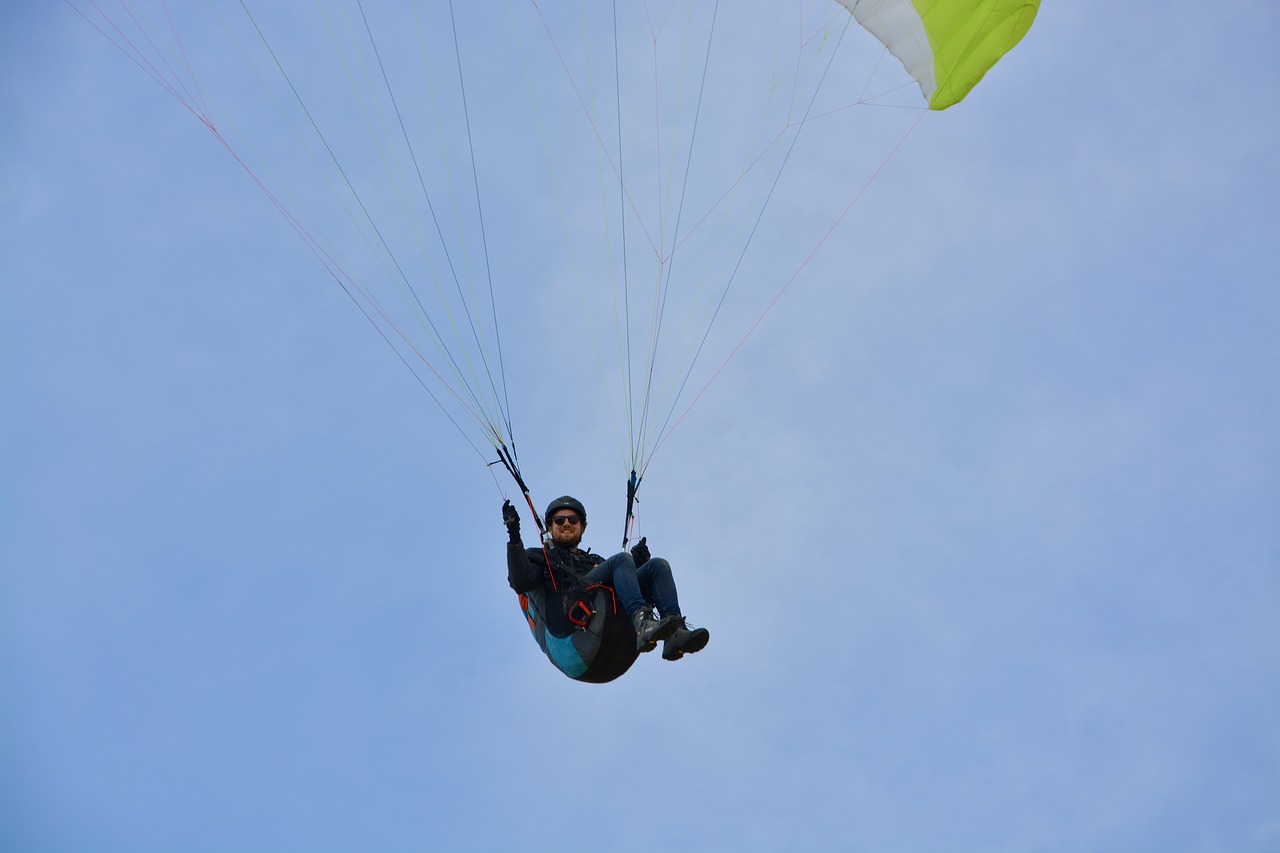 paragliding  paraglider pilots sit harness  paraglider free photo