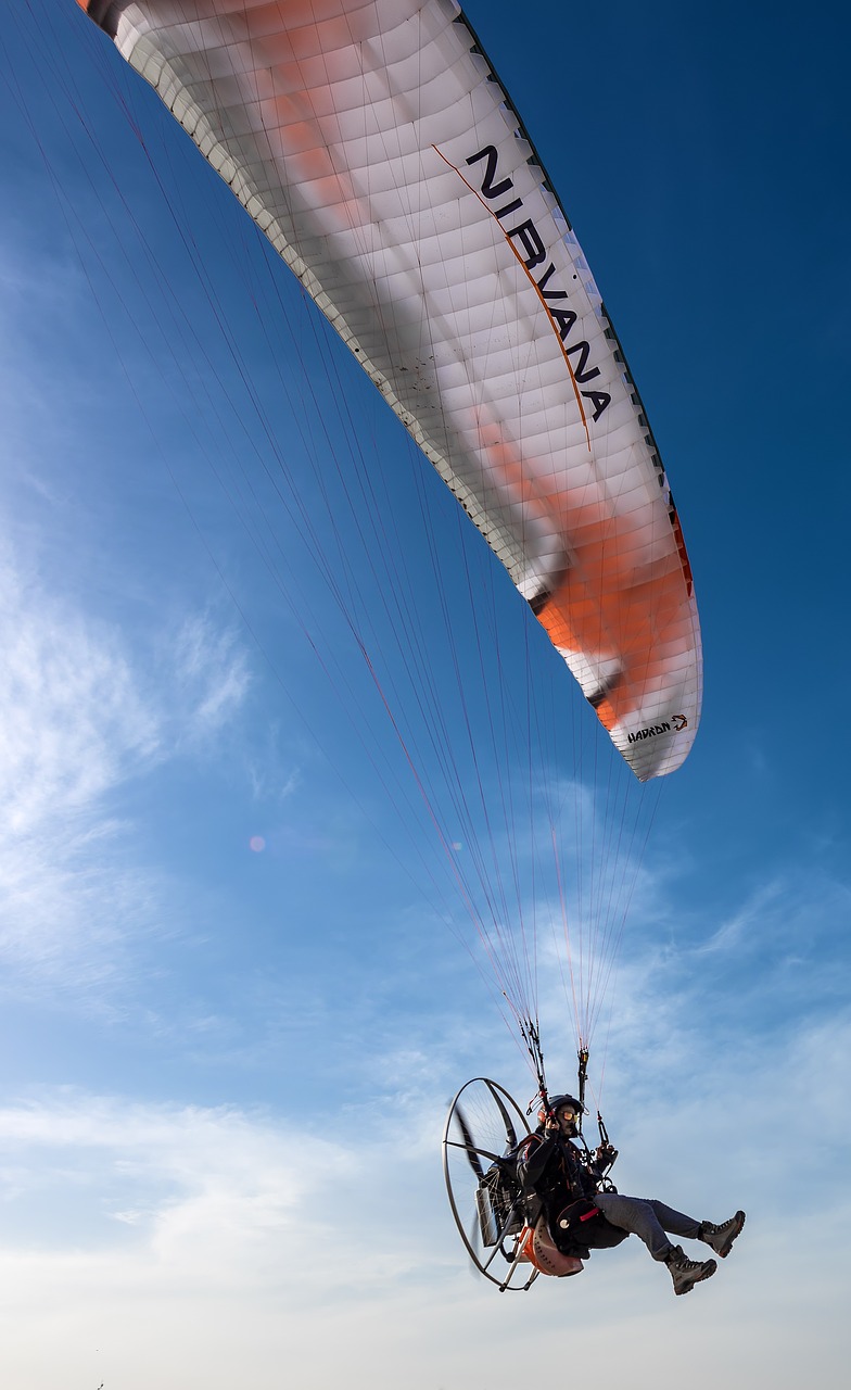 paragliding  parachute  sky free photo