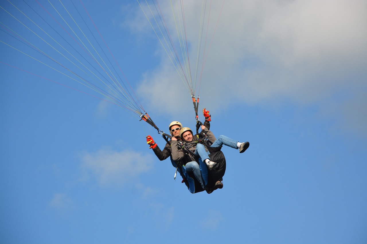paragliding  paraglider  tandem paragliding free photo