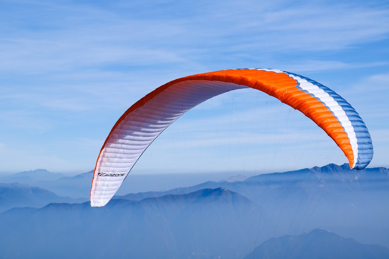 paragliding  sky  mountains free photo