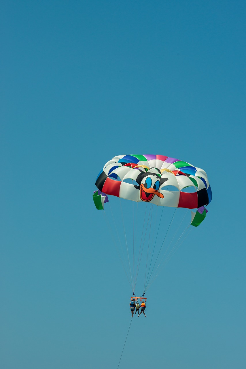 parasailing  parachute  sky free photo