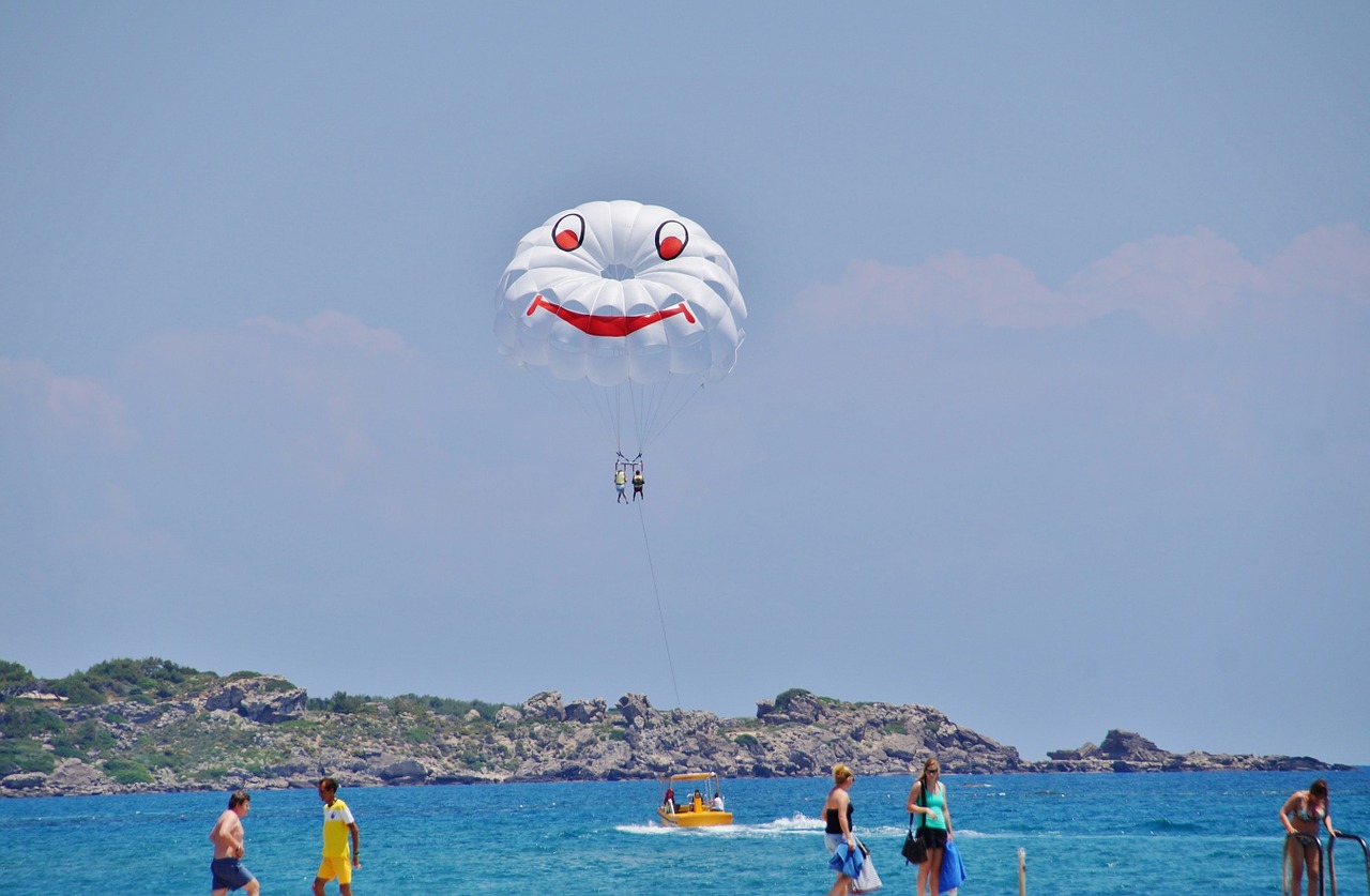 parasailing paragliding sea free photo