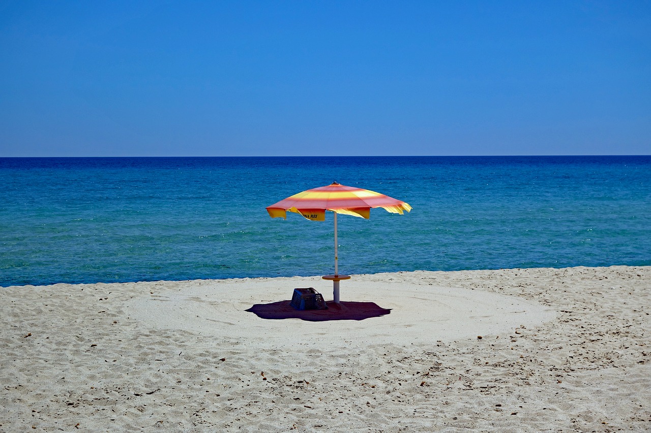 parasol  sardinia  sand free photo