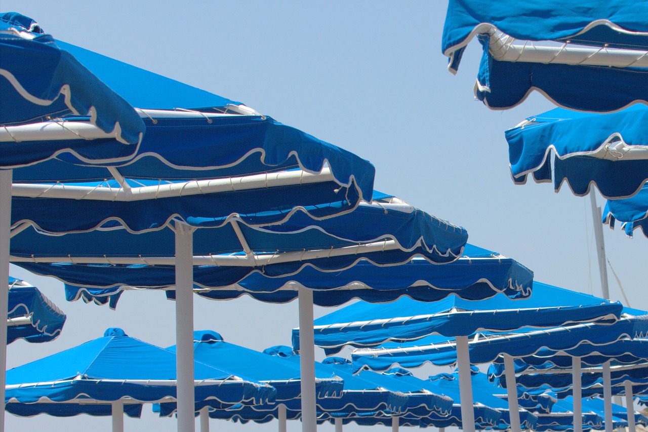 parasols  beach  water free photo