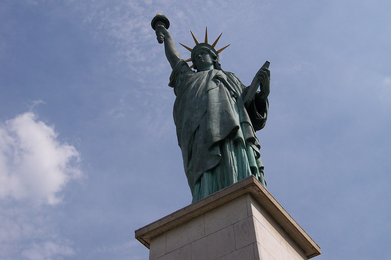 paris statue of liberty seine free photo